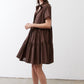 Dark brown poplin dress with V-neck and short sleeves, flared tiered skirt