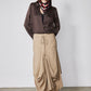 Coffee brown silk button-down top with scarf-style neck detail and long sleeves