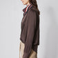 Coffee brown silk button-down top, side view, long sleeves and front buttons