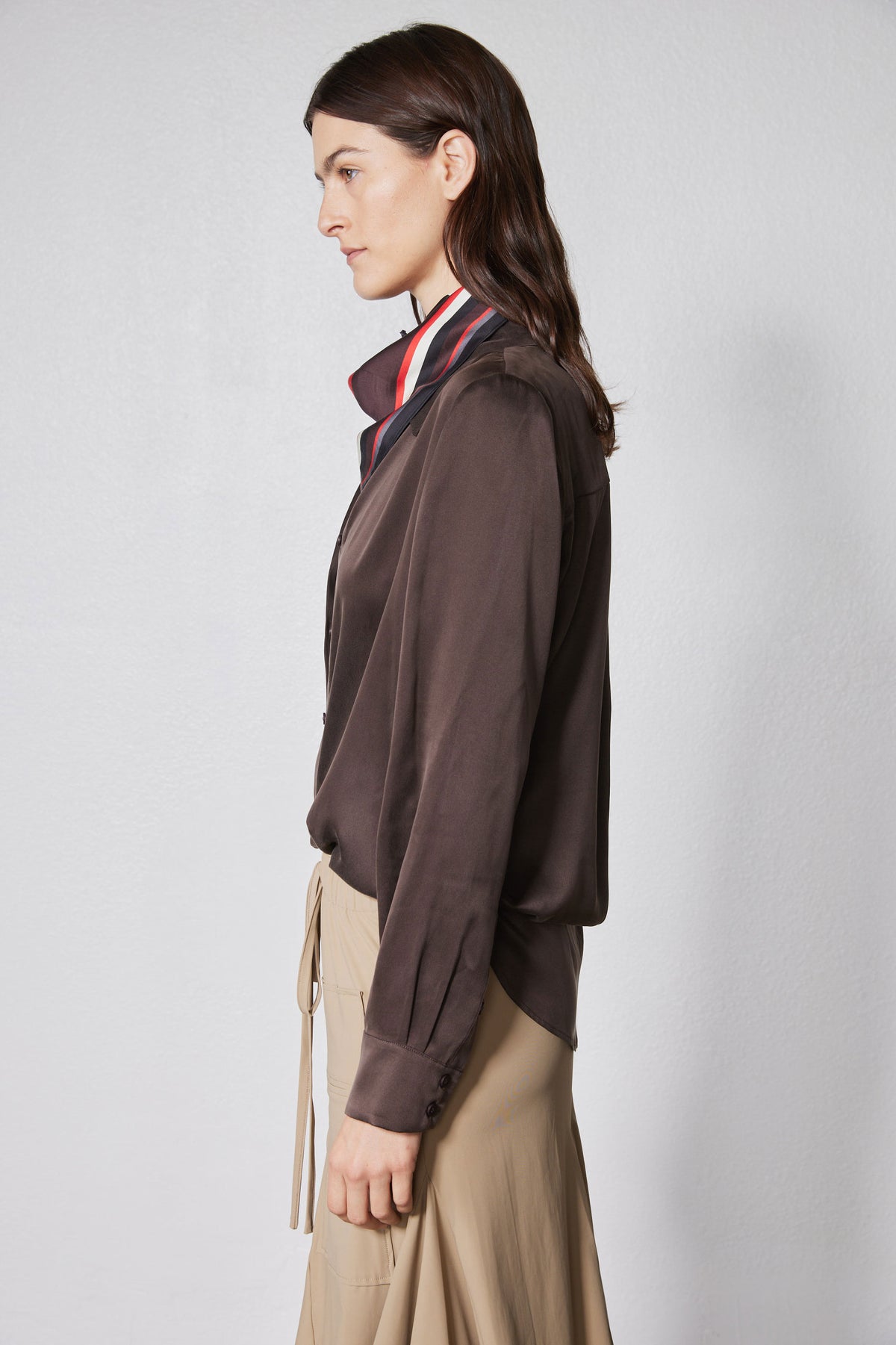 Coffee brown silk button-down top, side view, long sleeves and front buttons