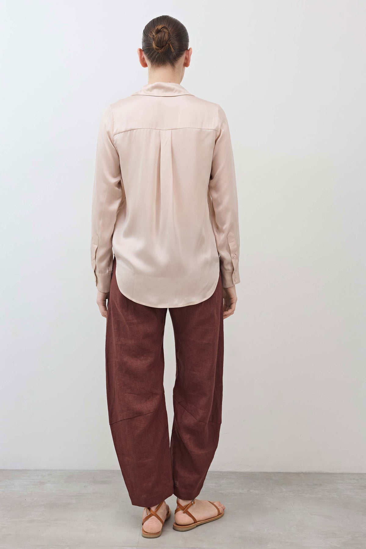 Peach blush silk button-down top, back view with yoke and center-back seam