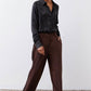 Black silk button-down top with pointed collar and button front, long sleeves