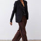 Black silk button-down top with pointed collar and button front, long sleeves