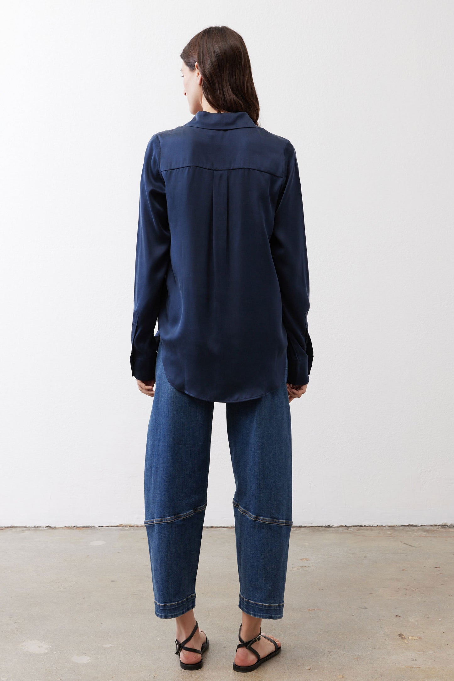 Dark blue silk button-down top, back view with collar and button detail