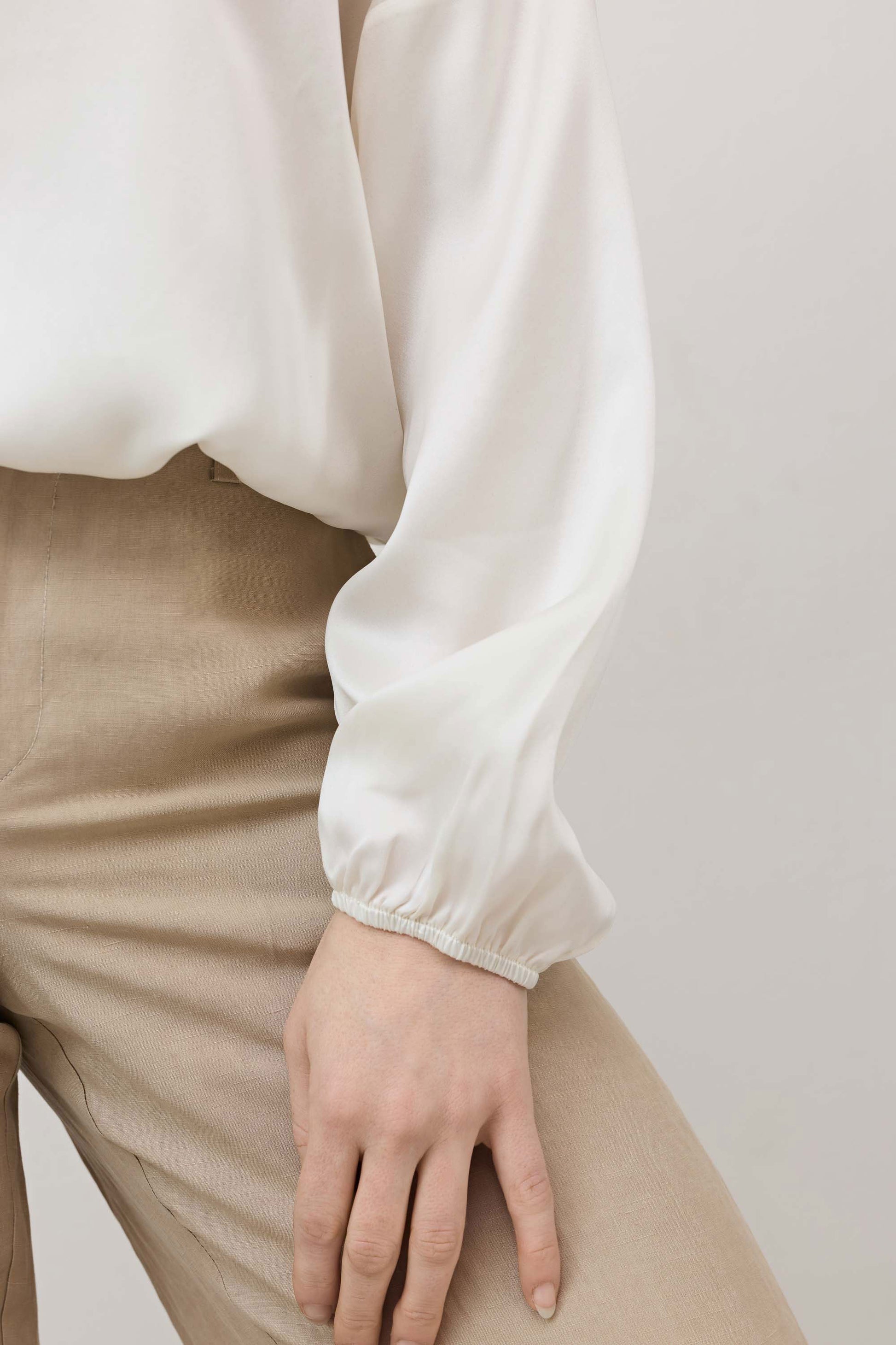 Ivory silk blouse sleeve with gathered cuff