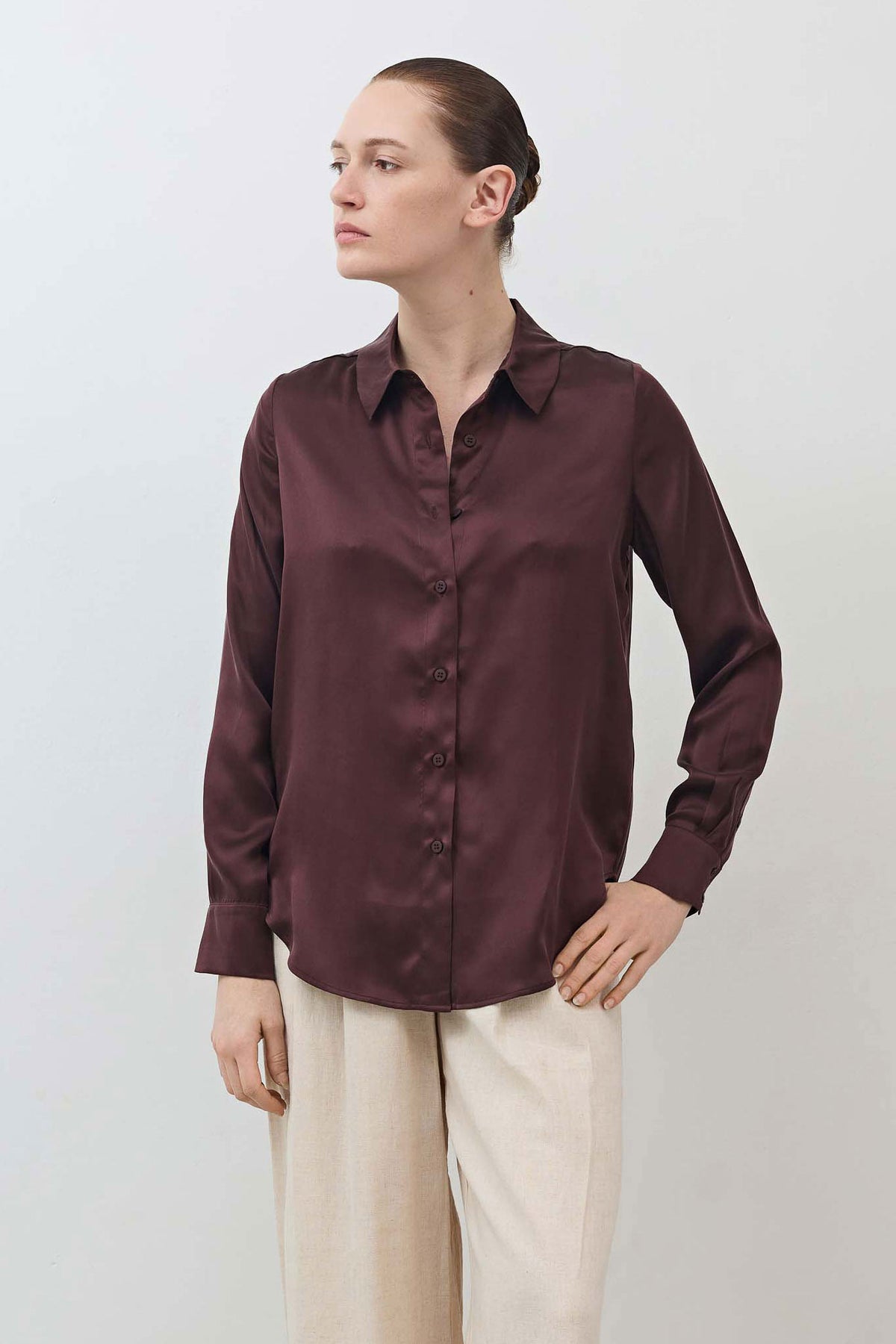 Dark plum silk button-down top with pointed collar, button front, and long sleeves
