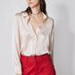 Peach blush silk button-down top with pointed collar, button placket, long sleeves