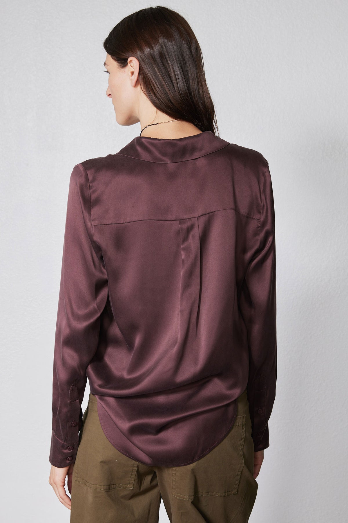 Deep plum silk button-down top, long sleeves, back view with draped yoke