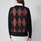 Back view of black argyle sweater with rust diamond pattern, long sleeves
