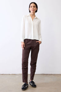 Coffee brown tapered jogger pants with elastic waistband and side pockets