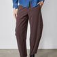 Coffee brown wide-leg pants with front pleats and ankle length hem