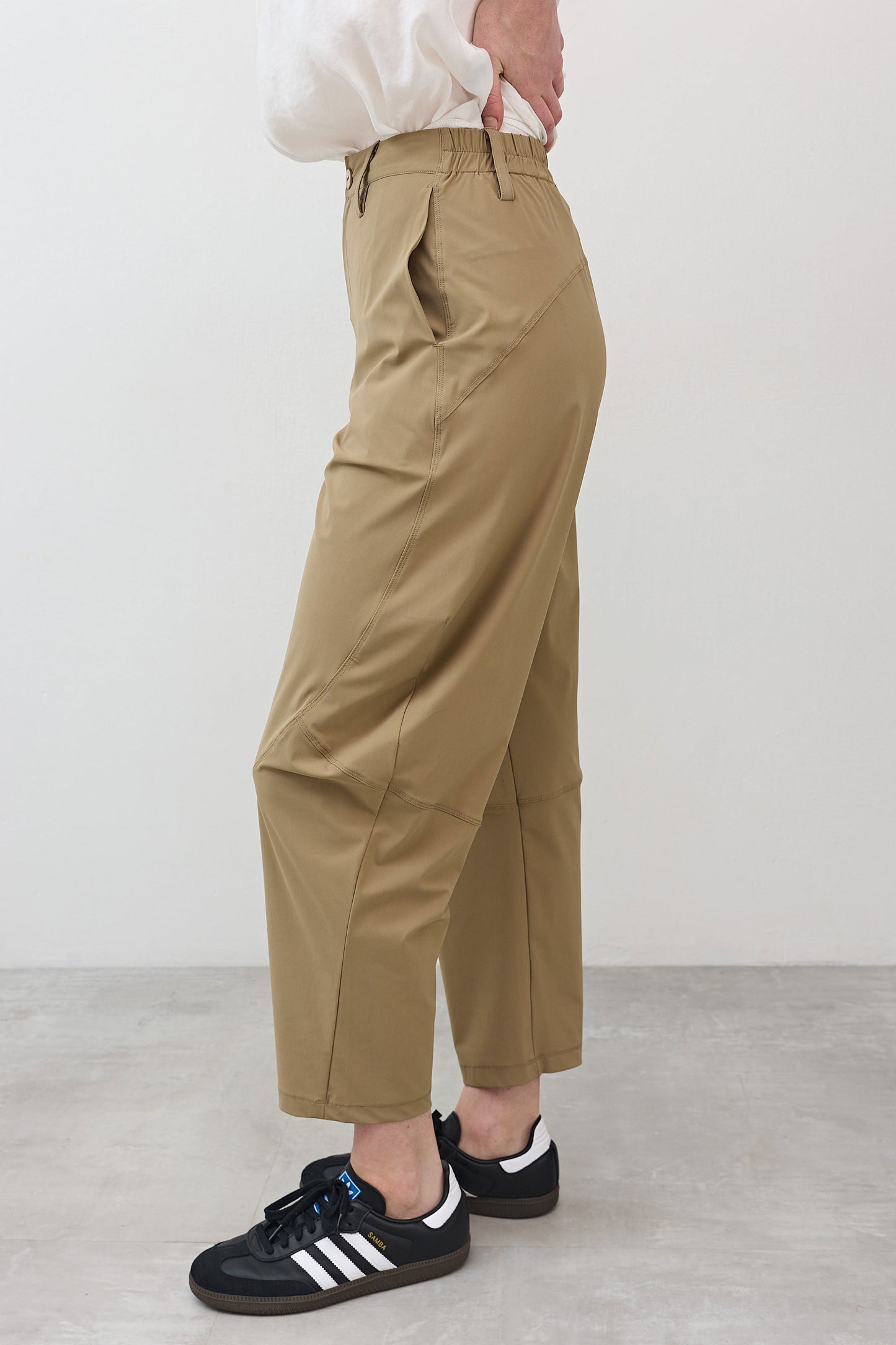 Dune wide-ish pants side view with relaxed fit and cuffed ankle hem
