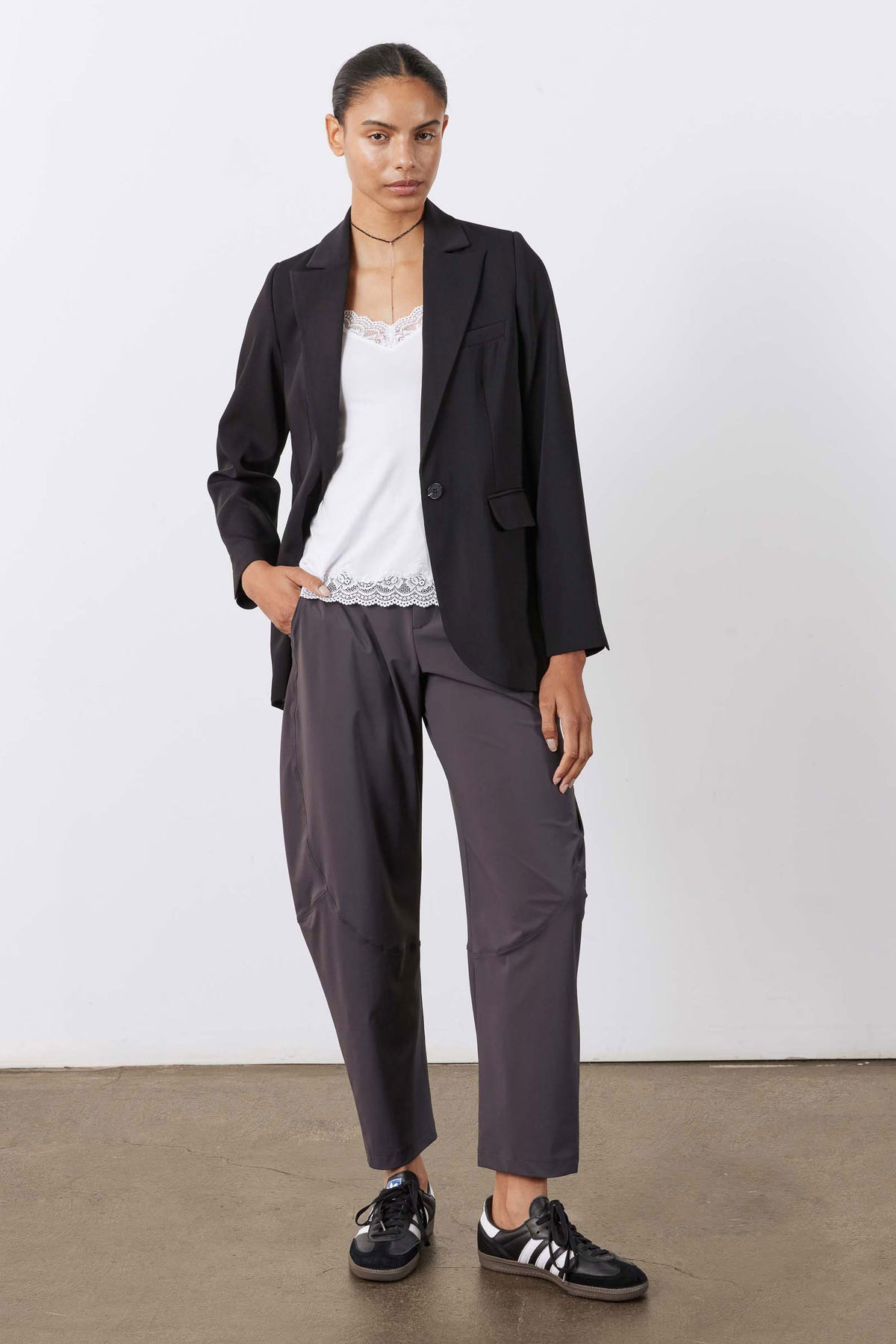 Graphite wide-leg pants with front button closure and side pockets
