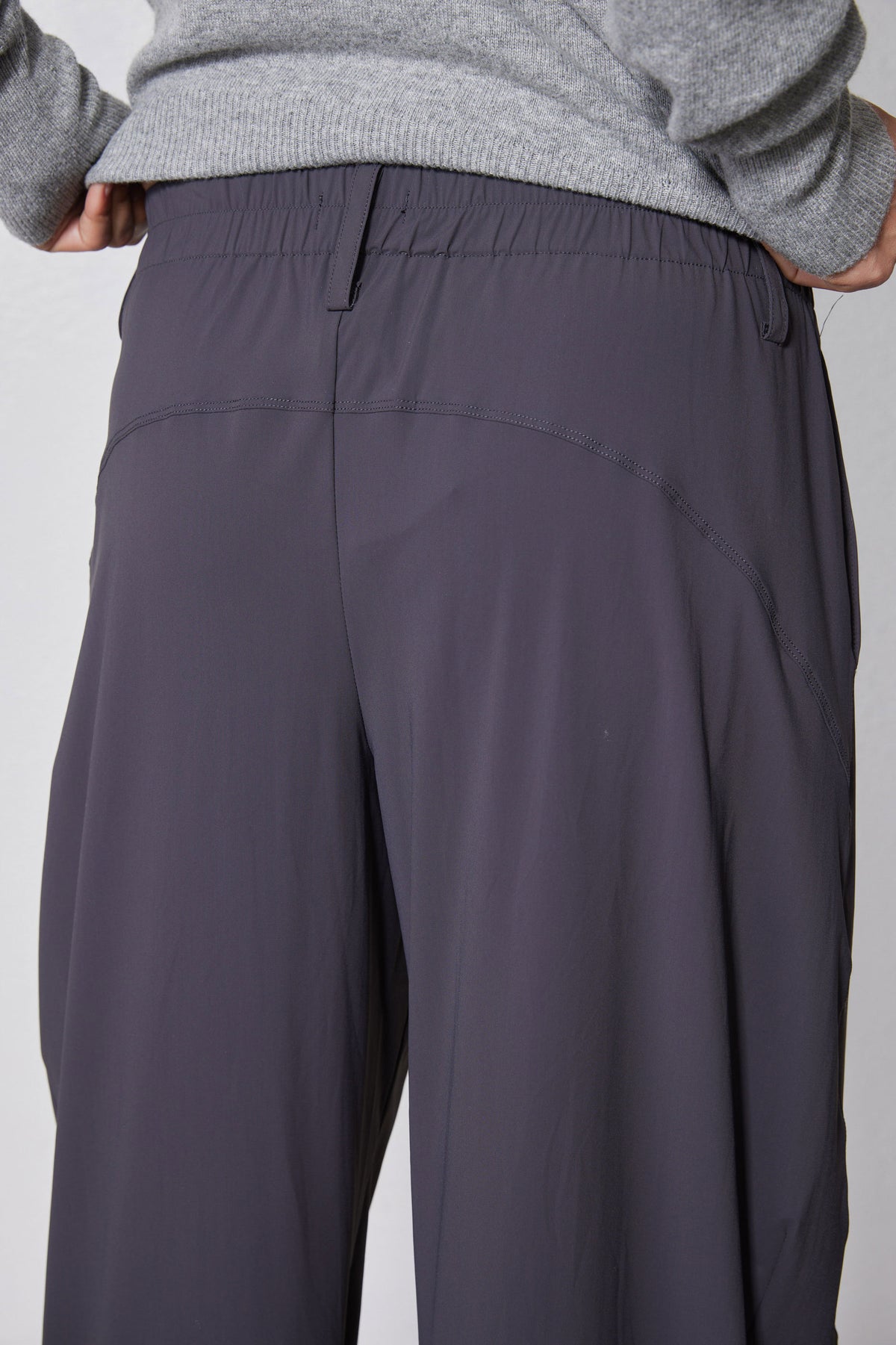 Graphite wide-leg pants with side pocket seams and gathered waistband