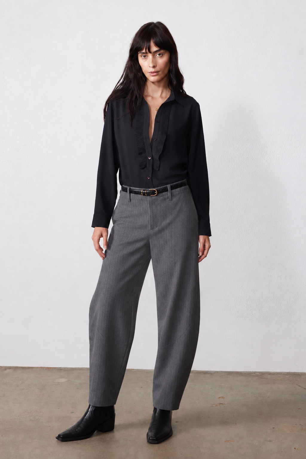 Gray pinstripe wide-leg suit pants, full length side-front view with belt and pockets
