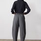 Gray pinstripe wide-leg suit pants, back view with belt loops and cuffed hem