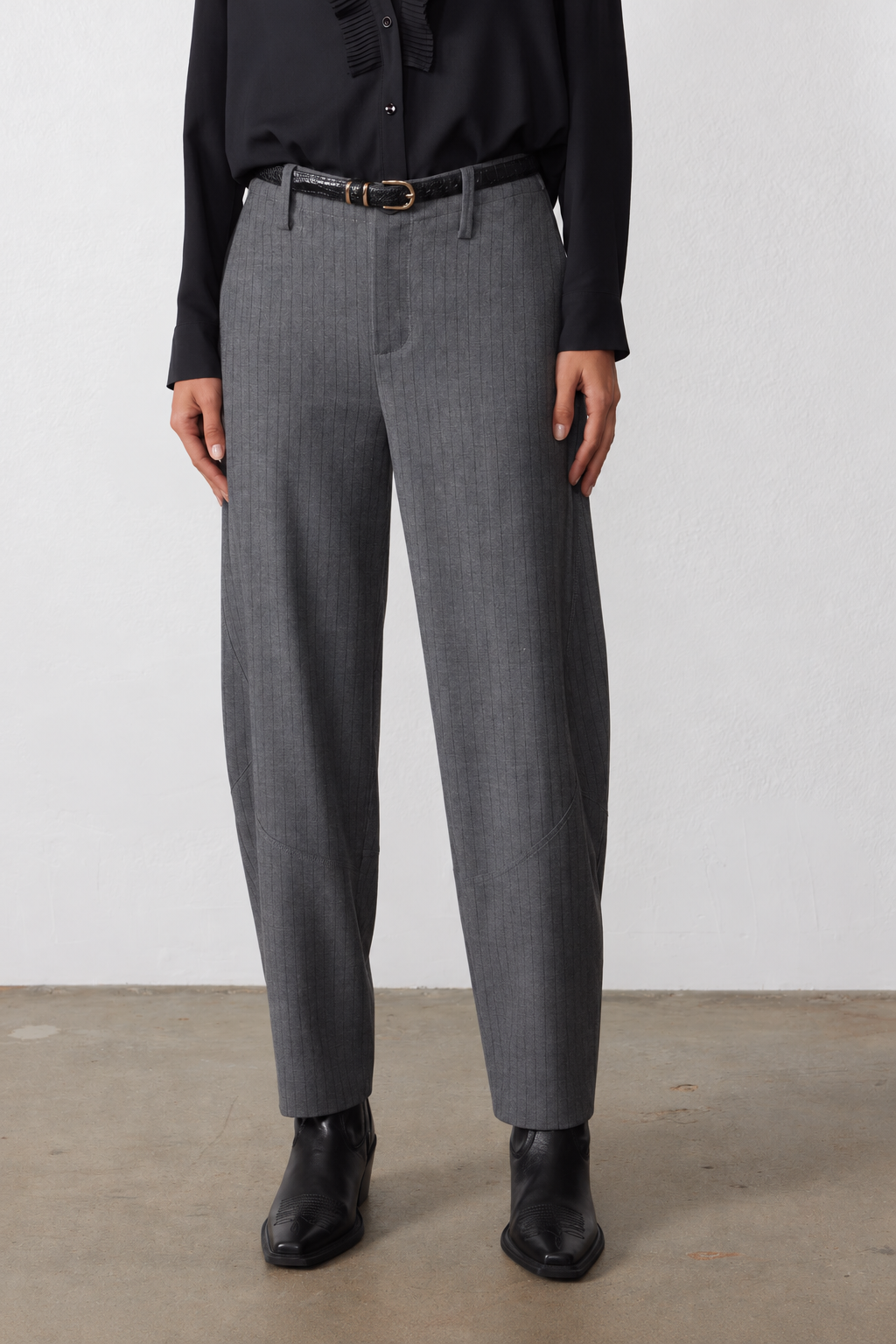 Gray pinstripe wide-leg suit pants with belt loops and center crease, front view