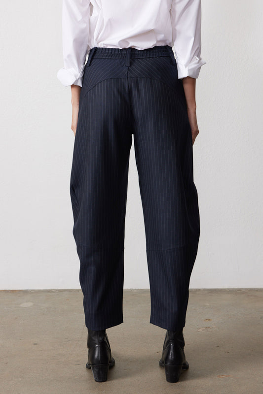 Navy gray pinstripe suit pants, front view with high waist and relaxed wide legs