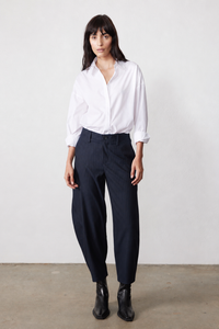 Navy gray pinstripe suit trousers with wide legs and high waist, belt loops and button front