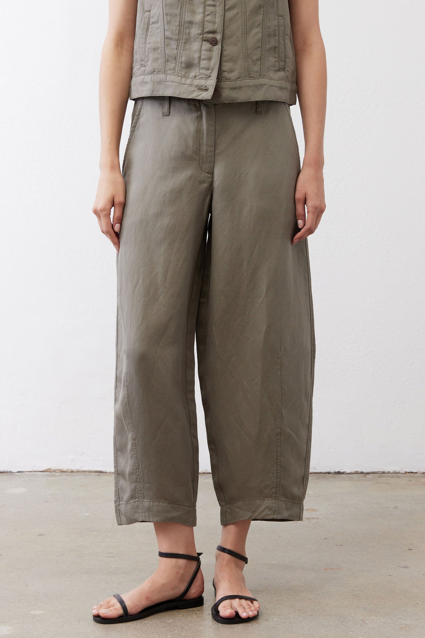 Olive petite wide-leg ankle pants with gathered waistband and roomy straight legs