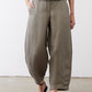 Wide-leg ankle pants in muted olive with button closure and wide cropped silhouette