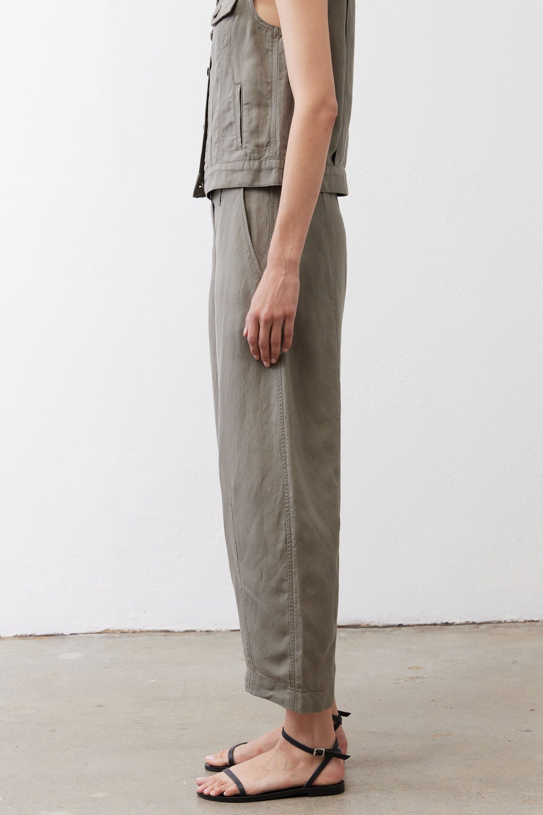 Wide-leg ankle pants in muted olive with relaxed fit and cropped ankle hem