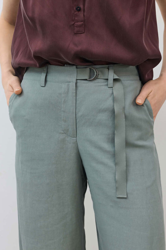 Chinois green belted wide-leg trousers, paperbag-style tie detail at waist