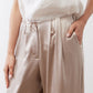 Champagne wide-leg trousers with ruched elastic waist and drawstring ties