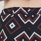 Elastic waistband trousers with diamond geometric print in navy, red, and white