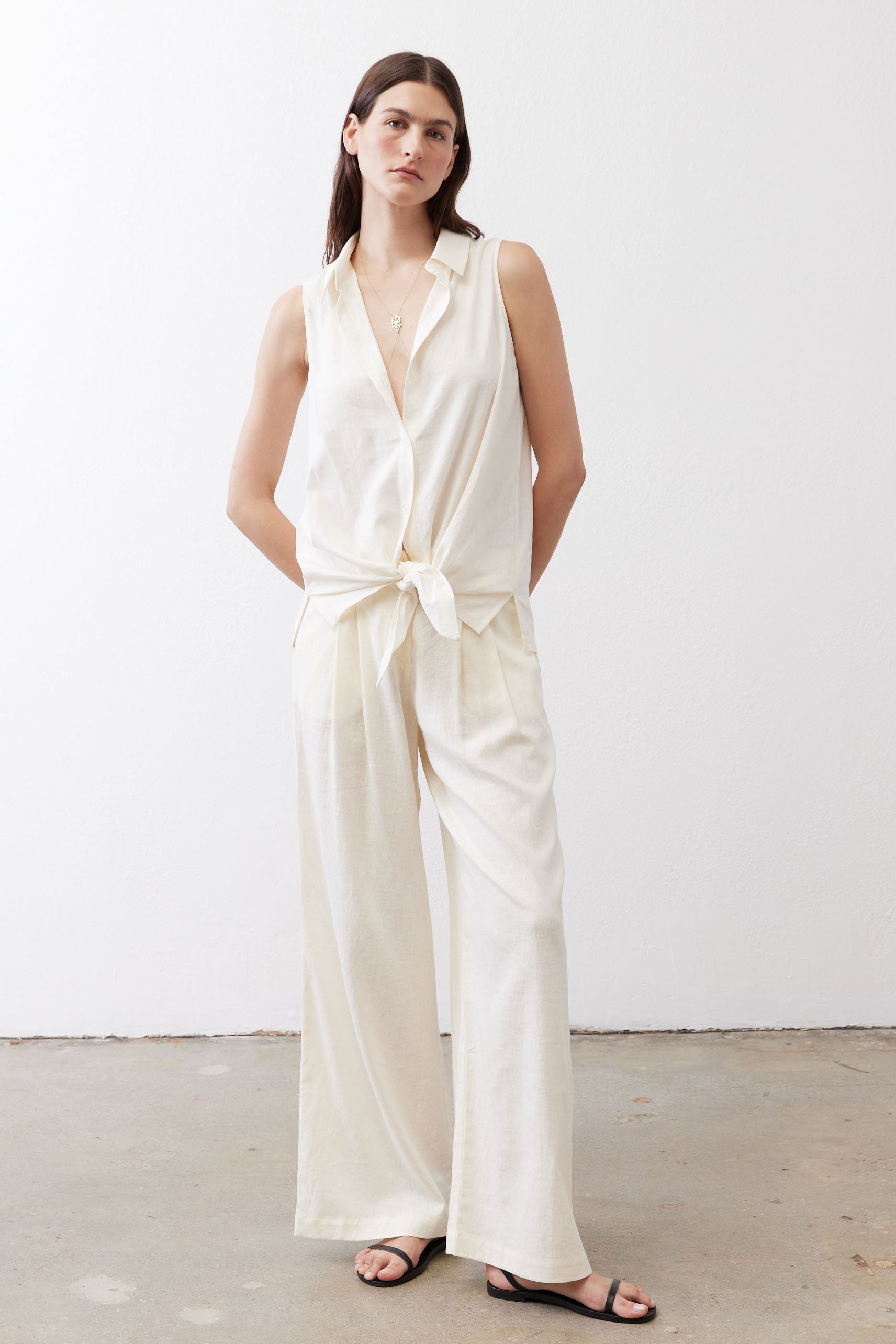 Ivory linen wide-leg trousers, tie-style waist detail, full length