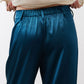 Deep teal trousers with elasticated waistband and front pockets