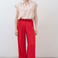 Blush oversized silk blouse with button-front and short sleeves
