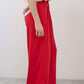 Tomato wide-leg trousers, side view with ankle-length wide hem