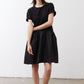 Black crewneck short-sleeve dress with gathered waist and skirt, above-knee