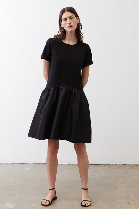 Black short-sleeve crewneck dress with gathered waist and full skirt, above-knee